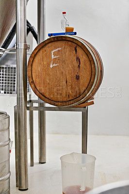 Buy stock photo Brewery equipment, barre and craft beer production in factory for natural fermentation. Manufacturing, cask and wood container for alcohol, distillery and storage for liquid at plant with cider