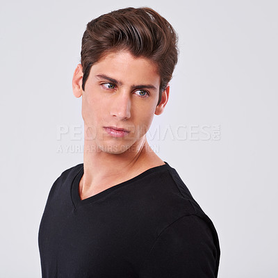 Buy stock photo Handsome man, grooming and style with hair, fashion or tshirt on a gray studio background. Attractive male person, caucasian or model with trendy hairstyle, clothing or barber treatment on mockup