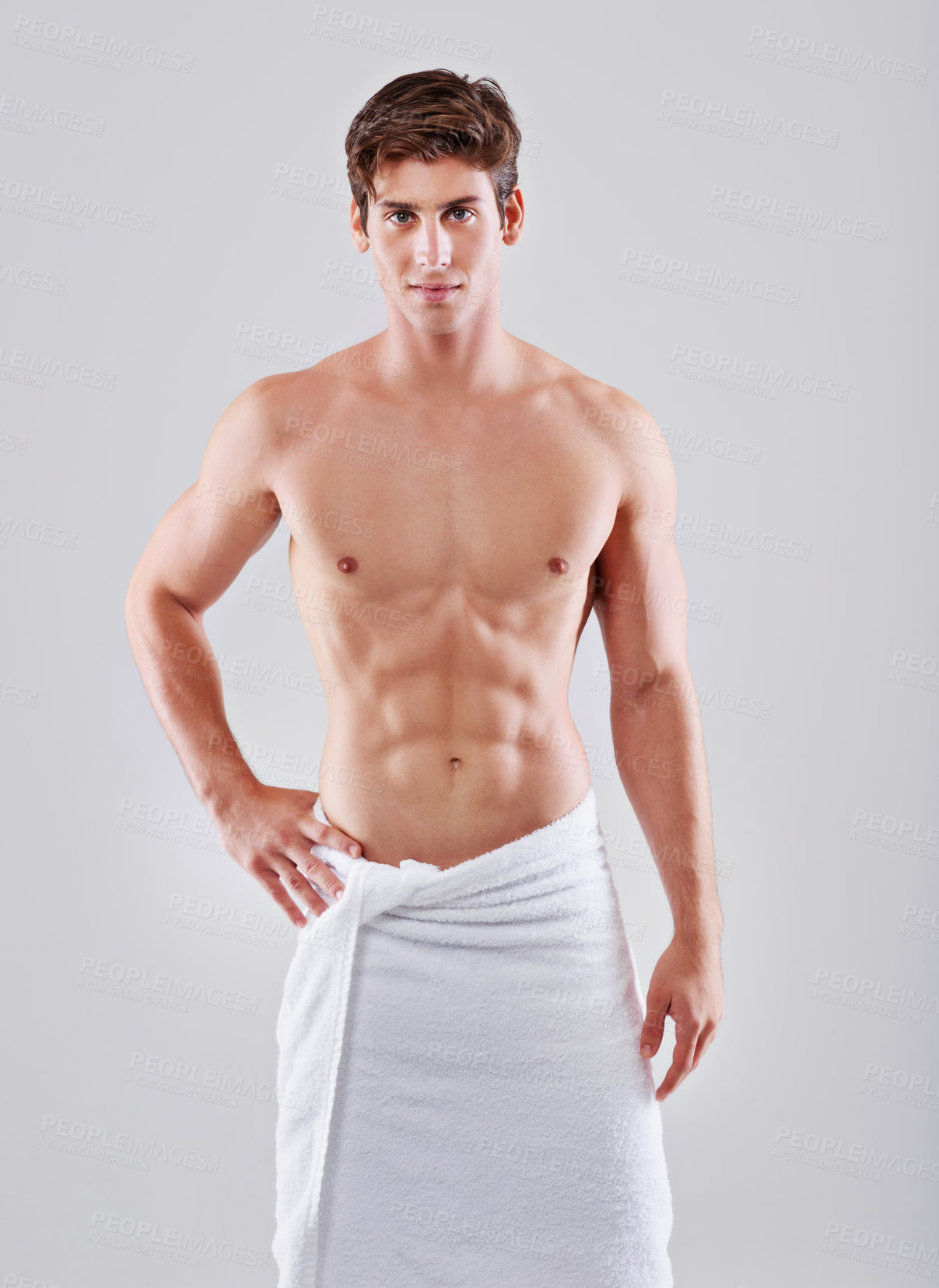 Buy stock photo Towel, shower and portrait of man on a white background for wellness, hygiene and cleaning for health. Skincare, bathroom and isolated person with muscle for grooming, self care and washing in studio
