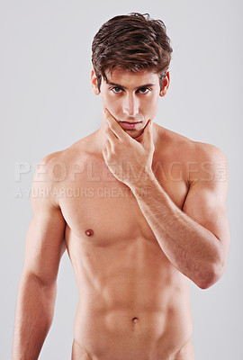 Buy stock photo Man, portrait and skincare confidence in studio or facial treatment with dermatology, wellness or grey background. Male person, face and hand with muscle on mockup space or wellbeing, health or pride