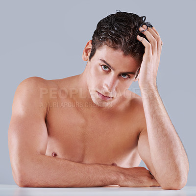 Buy stock photo Man, portrait and skincare health in studio or facial treatment with dermatology, wellness or grey background. Male person, face and model with hand on mockup space for wellbeing, hygiene or pride