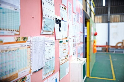 Buy stock photo Shot of a schedule board inside a factory