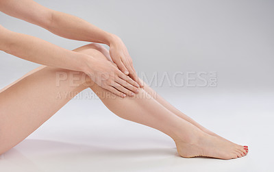Buy stock photo Woman, leg or hair removal as beauty, cosmetology or skincare as luxury, wellness on studio mockup. Female person, smooth or skin by epilation, dermatology or results of self care on white background