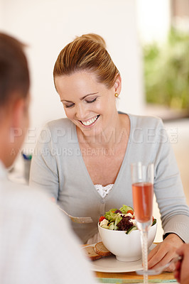 Buy stock photo Glass, woman and salad for eating, nutrition and food at restaurant, cafe and table for date with man. Female person, smile and girl with vegetables for health, wellness and clean diet with husband