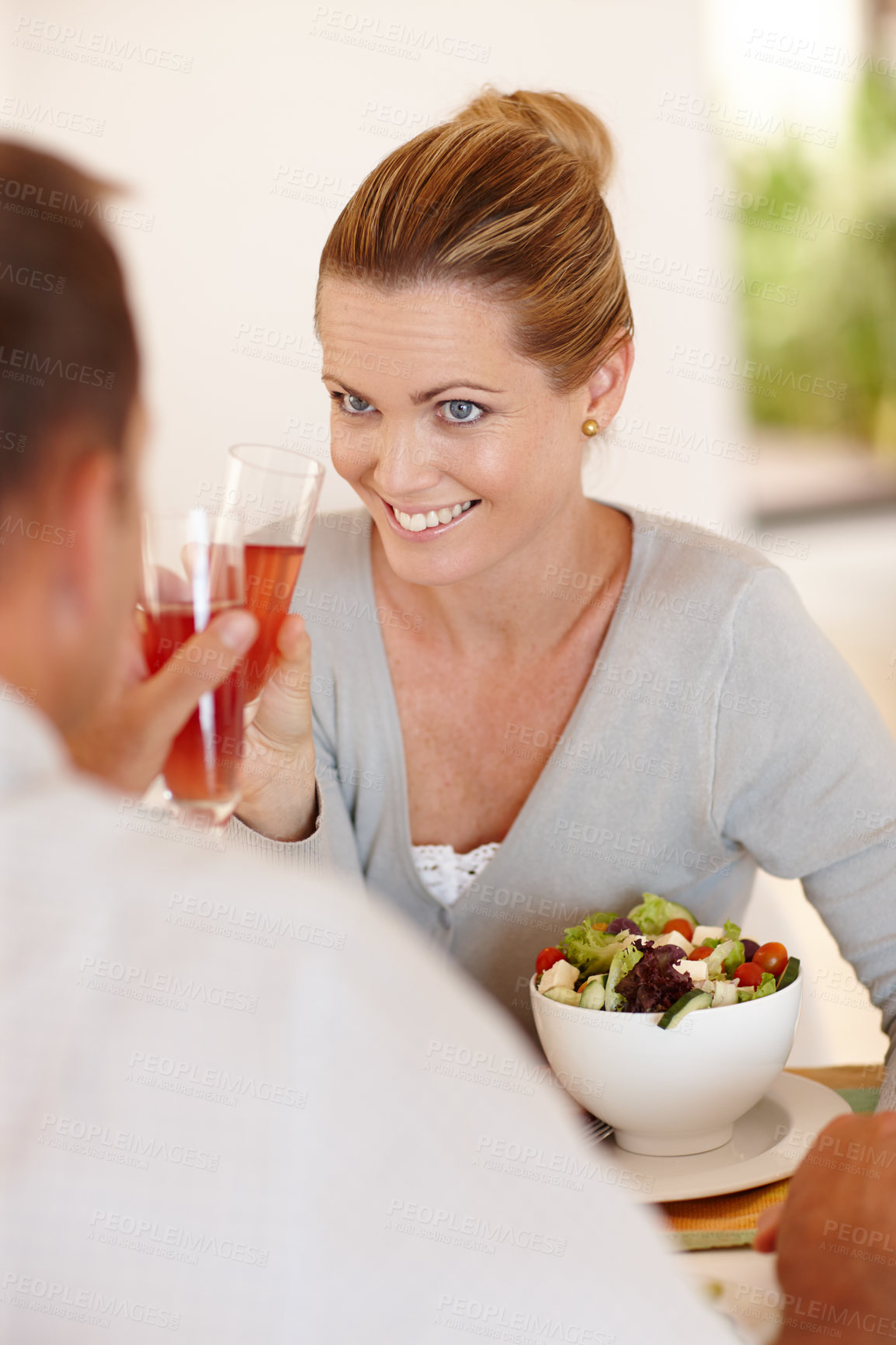 Buy stock photo Smile, woman and salad for eating, nutrition or food at restaurant, cafe and table for date with man. Female person, happiness and girl with vegetables for health, wellness or clean diet with husband