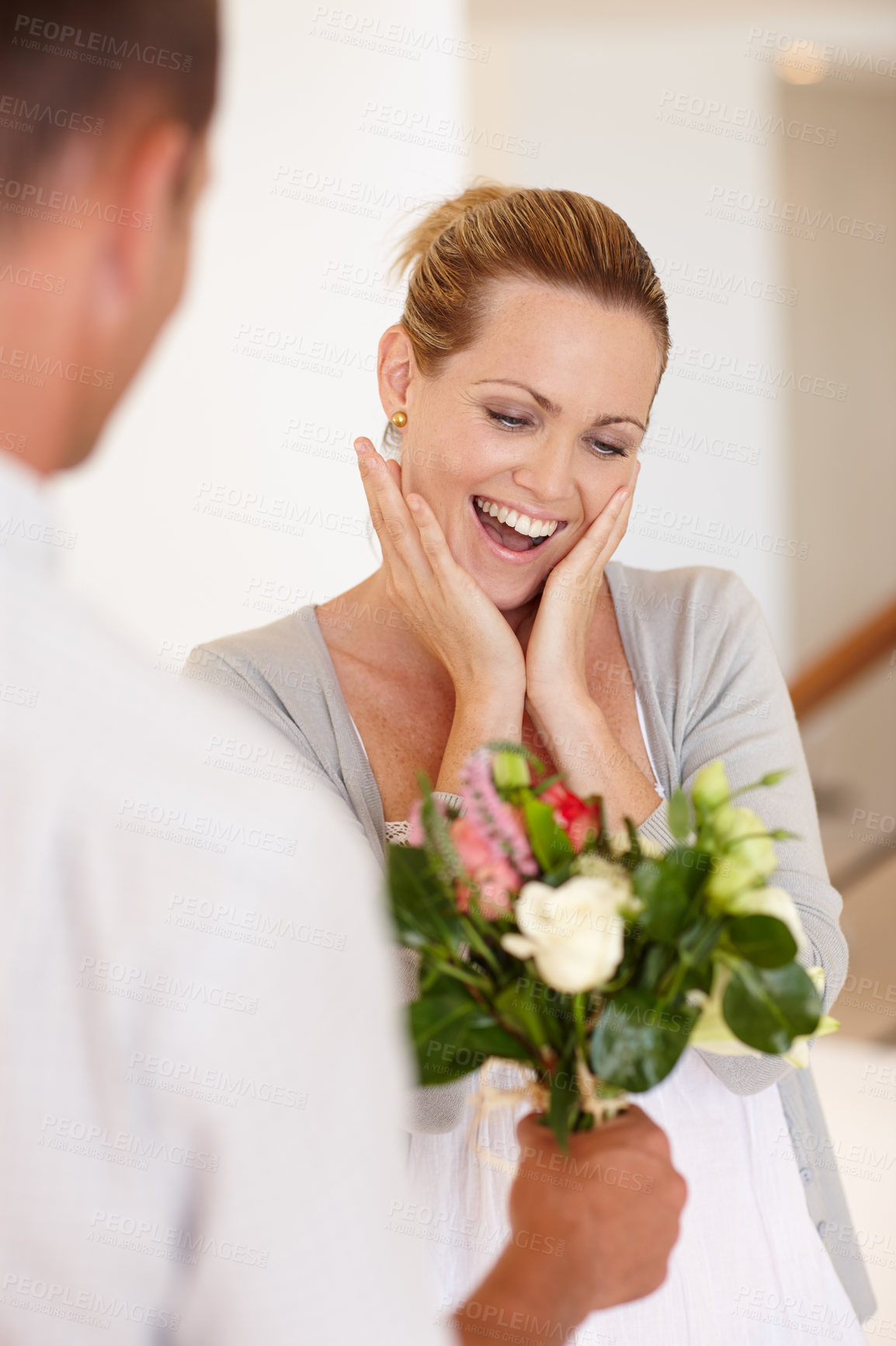 Buy stock photo Wow, surprise and woman with flowers for wedding, marriage and love with man for bonding in background. Female person, girl and wife with husband for bouquet, union and partnership of couple together