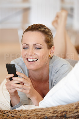 Buy stock photo Relax, phone or happy woman on sofa for social media, streaming movie or film on internet or web. Smile, chat or female person in home texting on online on mobile app to search fora funny meme post