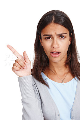 Buy stock photo Confused woman, portrait and pointing at space for mockup sale, discount or promotion. Shocked face of female model with hand for advertising or product placement isolated on a white background
