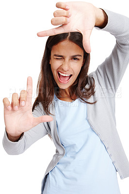 Buy stock photo Business woman, framing face and portrait of a person holding hands with a smile. White background, isolated and vertical frame of a female employee in a studio with mock up making a image hand sign