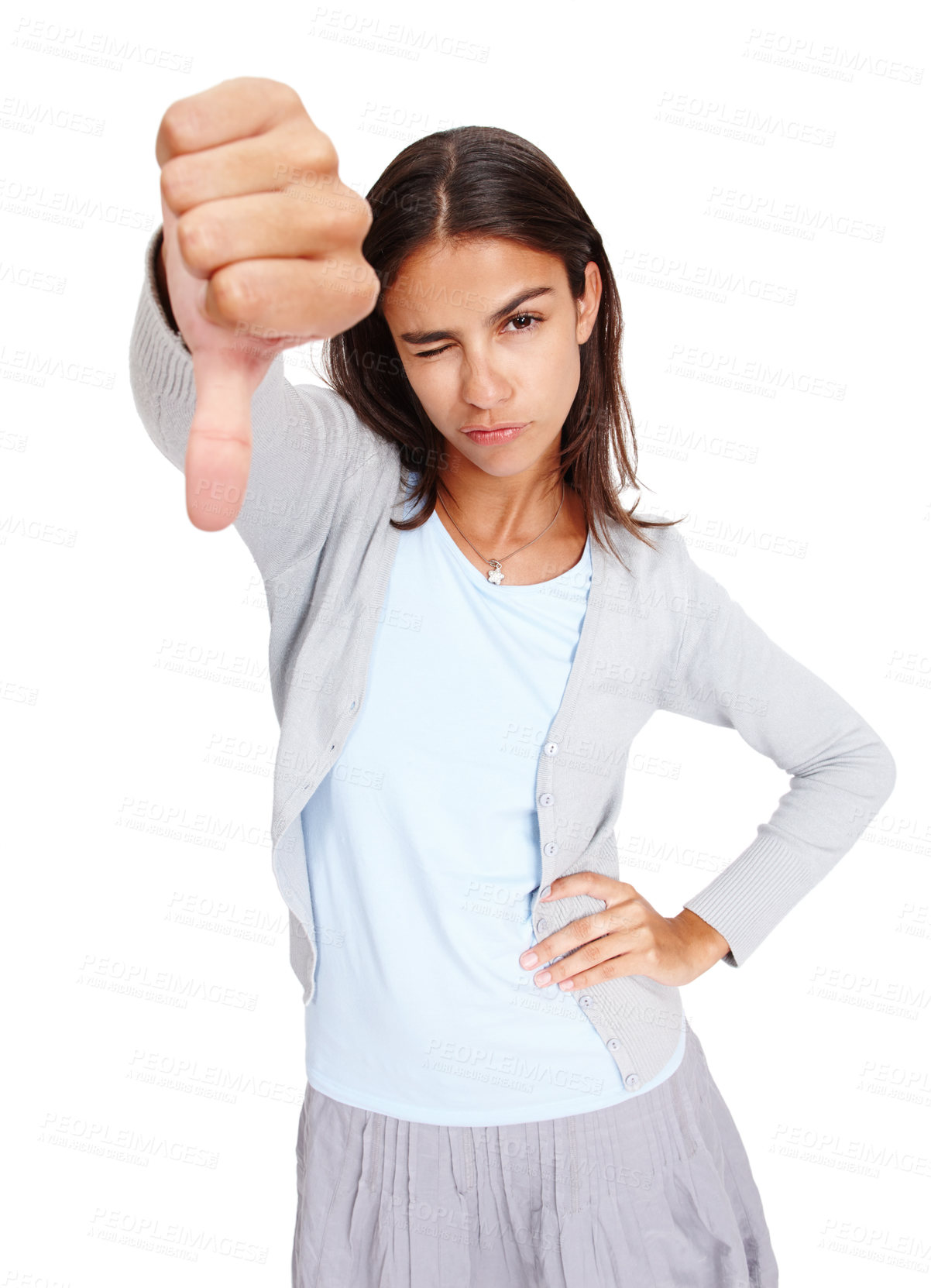 Buy stock photo Young woman, hand and thumbs down with wink in disappointment, fail or wrong against a white studio background. Portrait of isolated female showing down thumb to disagree, incorrect or negative