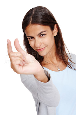 Buy stock photo Woman, portrait and hand for advertising size, space and small mockup with a smile in studio. Female model in studio showing fingers or sign for scale, inch or symbol isolated on a white background