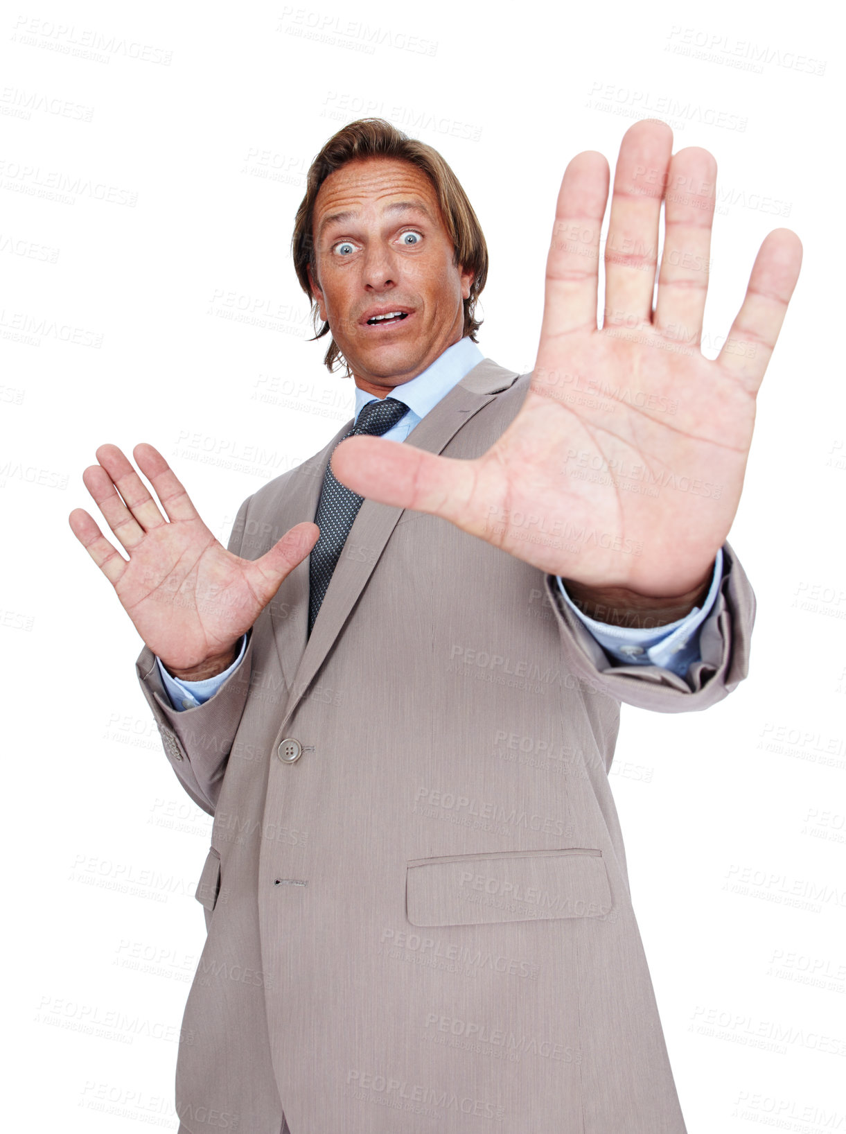 Buy stock photo Stop, hand and businessman in shock in a studio with a frightened or scared facial expression. Surprise, fear and portrait of a male in a suit with a hold gesture isolated by a white background.