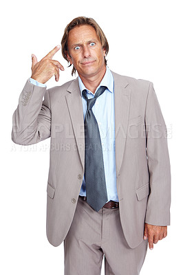 Buy stock photo Businessman, gun hand and head in studio with stress, annoyed and tired by white background. Senior corporate executive, isolated and comic hand sign while frustrated, overworked and anxious from job