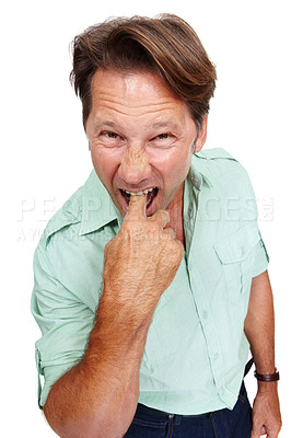 Buy stock photo Portrait, gross and nausea with a man model in studio isolated on a white background feeling ill or sick. Face, finger and mouth with a male standing on blank space in disgust or expressing turn off