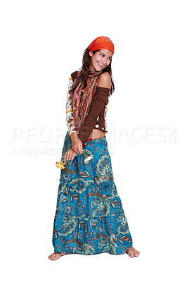 Buy stock photo Woman, fashion and smile in studio with dress for gypsy, creativity and bohemian style for trend. Lady, model and happy with flower and skirt for aesthetic and clothes with pattern, colour and hippie