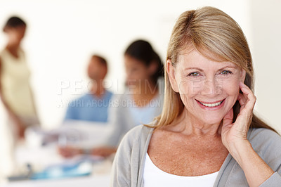 Buy stock photo Happy, face and smile for businesswoman, office and meeting in workplace with colleagues. Portrait, leader and senior manager person for design business, CEO and teamwork with company employees