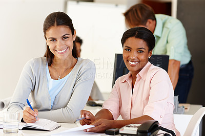 Buy stock photo Woman, portrait and desk with office staff, team for collaboration administrators or sitting employees. Working, together or writing in notebook for schedule appointment in coworking workspace