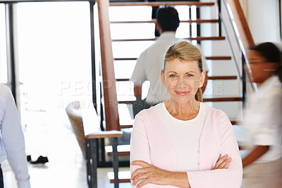 Buy stock photo Woman, CEO and busy office with arms and smile for work, leader or management or senior. Female person, boss and corporate or mature with experience for job, businesswoman or career executive