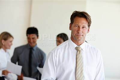 Buy stock photo Corporate, meeting and portrait of businessman with smile for team building, planning and collaboration. Employee, happy and confident in office for brainstorming, workshop or teamwork in conference