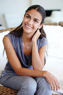 Buy stock photo Thinking, happy and smile of Indian woman, couch and relax at home for comfort. Confidence, face and calm or cheerful for daydream in house, lounge or living room and apartment for peace on sofa