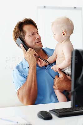 Buy stock photo Father, baby and phone call for remote work in home with multitasking, connectivity and communication. Man, young male child and talking on telephone with computer, online and desktop in house 