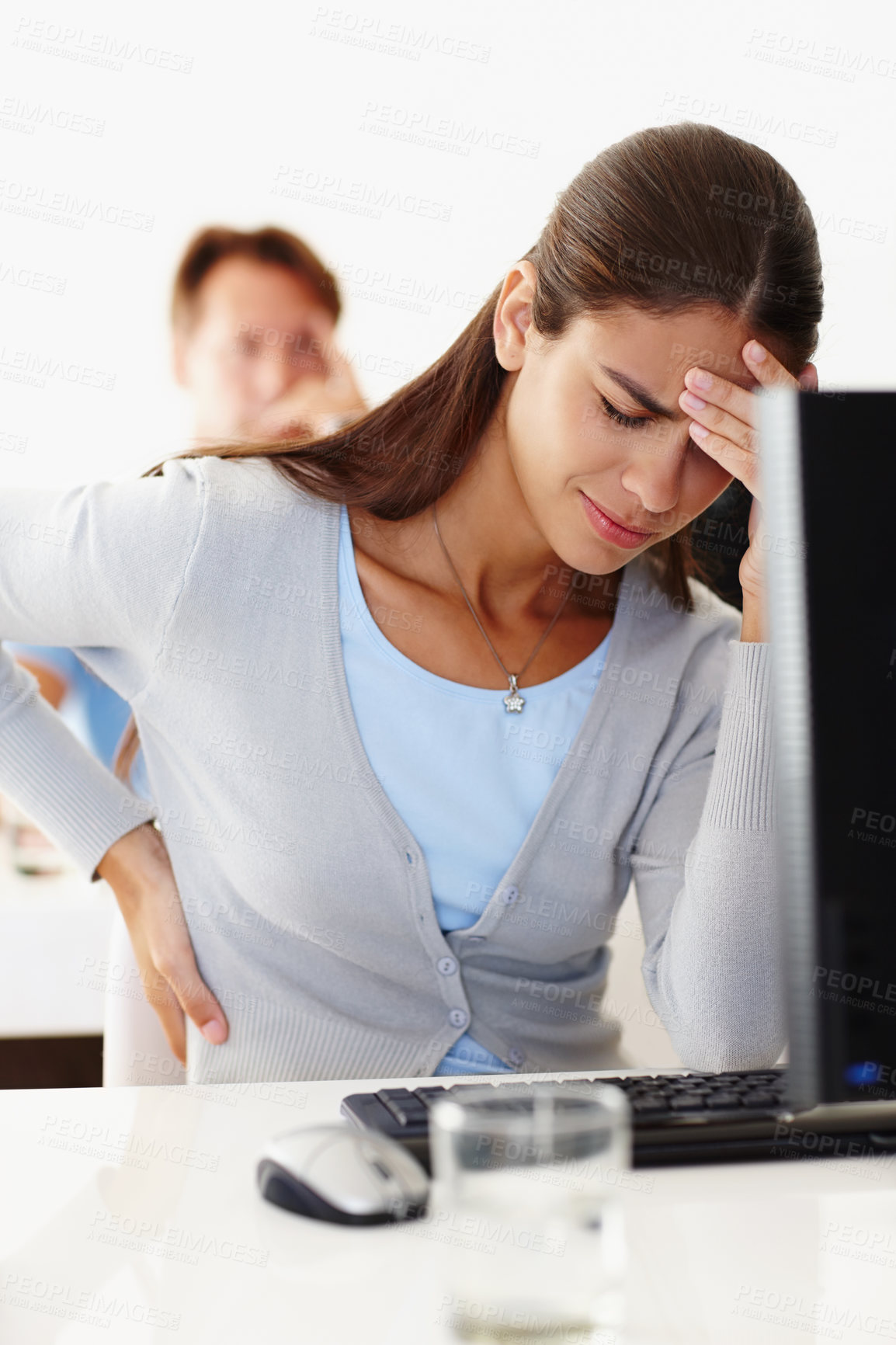 Buy stock photo Woman, back pain and stress in office with computer at work, migraine or headache at workplace. Female employee and tension at desk in workroom with technology, discomfort or injury and difficulty