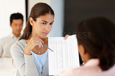 Buy stock photo Woman, meeting and paper with pen in office for investment review, finance consultation or feedback. Financial advisor, document and discussion at work for accounting, strategy or budget planning