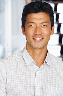 Buy stock photo Portrait, man and smile in creative office, entrepreneur career and workplace. Happy, professional and Asian male person in business, confident staff member and proud Japanese people in workspace