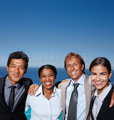 Buy stock photo Corporate, portrait and business people with smile by ocean for team building, collaboration and support. Diversity, employees and happy by sea in nature for company cruise, travel and partnership