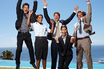 Buy stock photo Shot of a group of business people jumping in the air in excitement