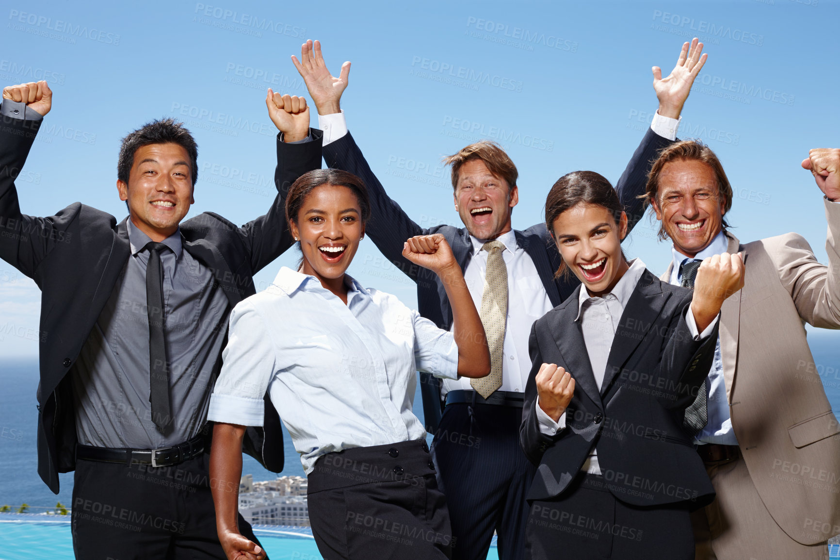 Buy stock photo Business people, portrait and group celebration or winning outdoor with hands up for start up victory, deal or partnership. Men, women and team building at ocean for company, achievement or corporate