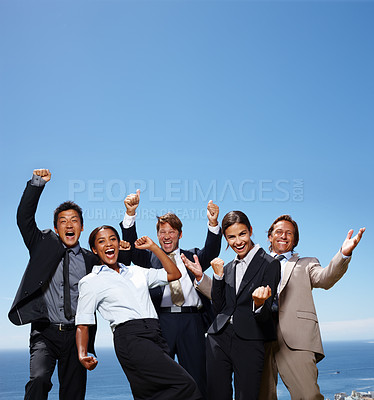 Buy stock photo Business people, portrait and fist celebration outdoor or hands up or start up victory, deal or partnership. Men, women and team building at ocean for company winning or corporate, support or mockup