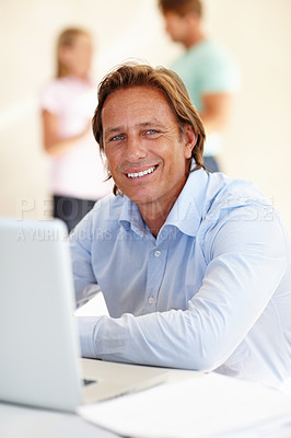 Buy stock photo Man, smile and portrait with laptop in office for internet, research online and website for company. Mature person, editor and happy with tech for typing, email and creative project for work and job 