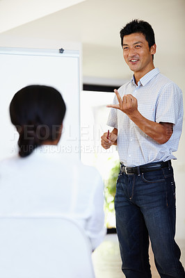 Buy stock photo Asian man, presentation and workshop for meeting, planning and teaching for collaboration. Businessman, strategy and happiness with white board, seminar and teamwork for project in office workplace