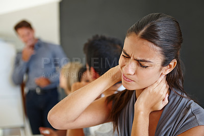 Buy stock photo Meeting, employee and woman with stress, neck pain and overworked with a deadline or burnout in a modern office. People, business or financial consultant with a headache or medical issue with anxiety