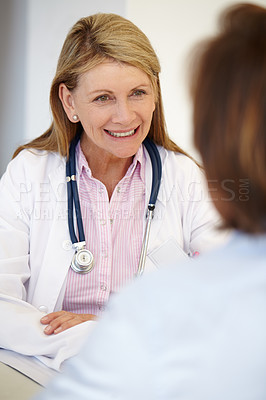 Buy stock photo Portrait of a mature female doctor having a conversation