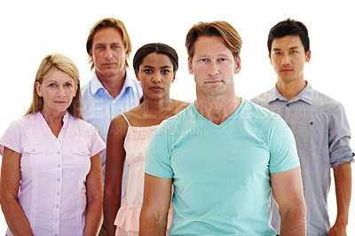 Buy stock photo Five adults of varying ages and ethnicities standing in a group with serious expressions