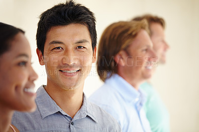 Buy stock photo Asian man, diversity and coworker in row with smile for teamwork or collaboration and coworking as consultant. Portrait, colleagues and people as employees with confidence for business and growth