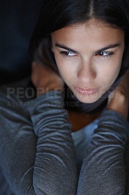 Buy stock photo Headshot of a female in dark clothing. Closeup of an attractive young indian woman in a black studio background with dark features. A serious model with natural beauty. Young woman showing confidence