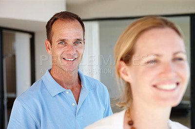 Buy stock photo Portrait, couple and smile of man in home for bonding, love or healthy relationship together in living room. Face, happy woman and partner in house for connection, commitment or marriage in apartment