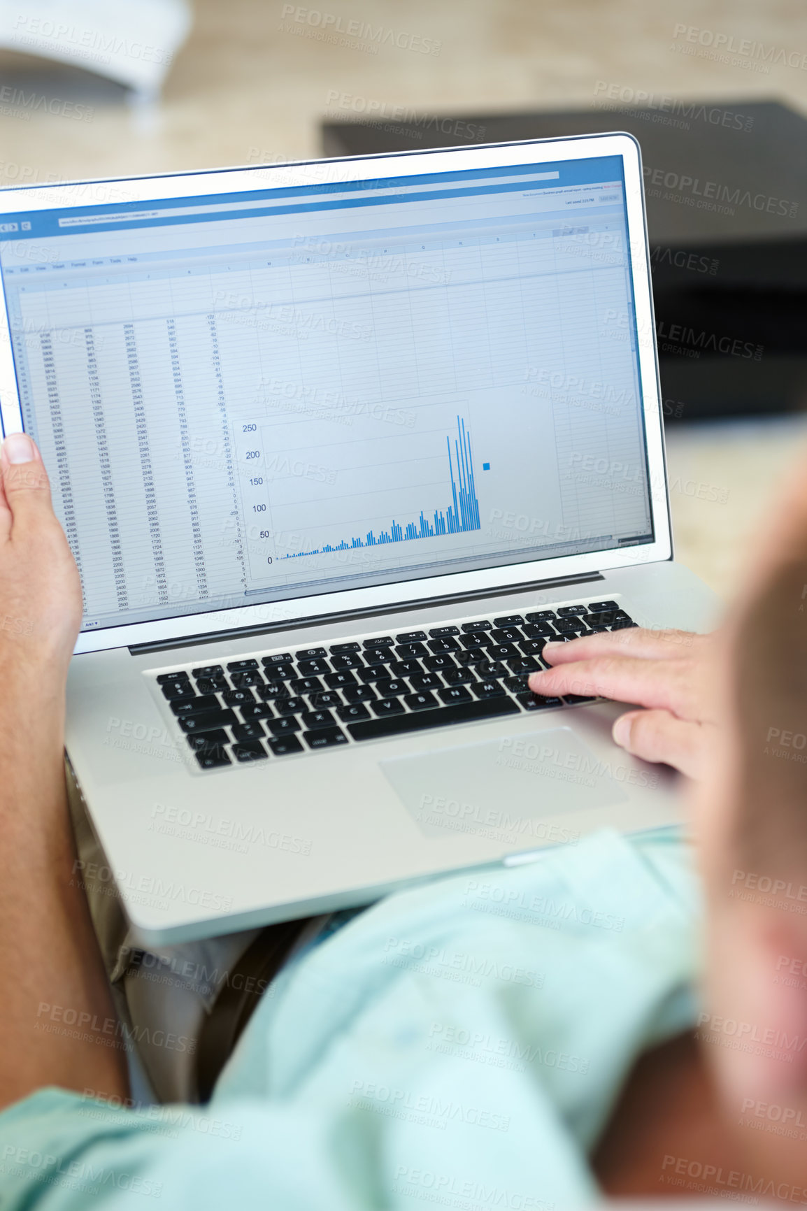 Buy stock photo Closeup cropped shot of a man working on his laptop from home