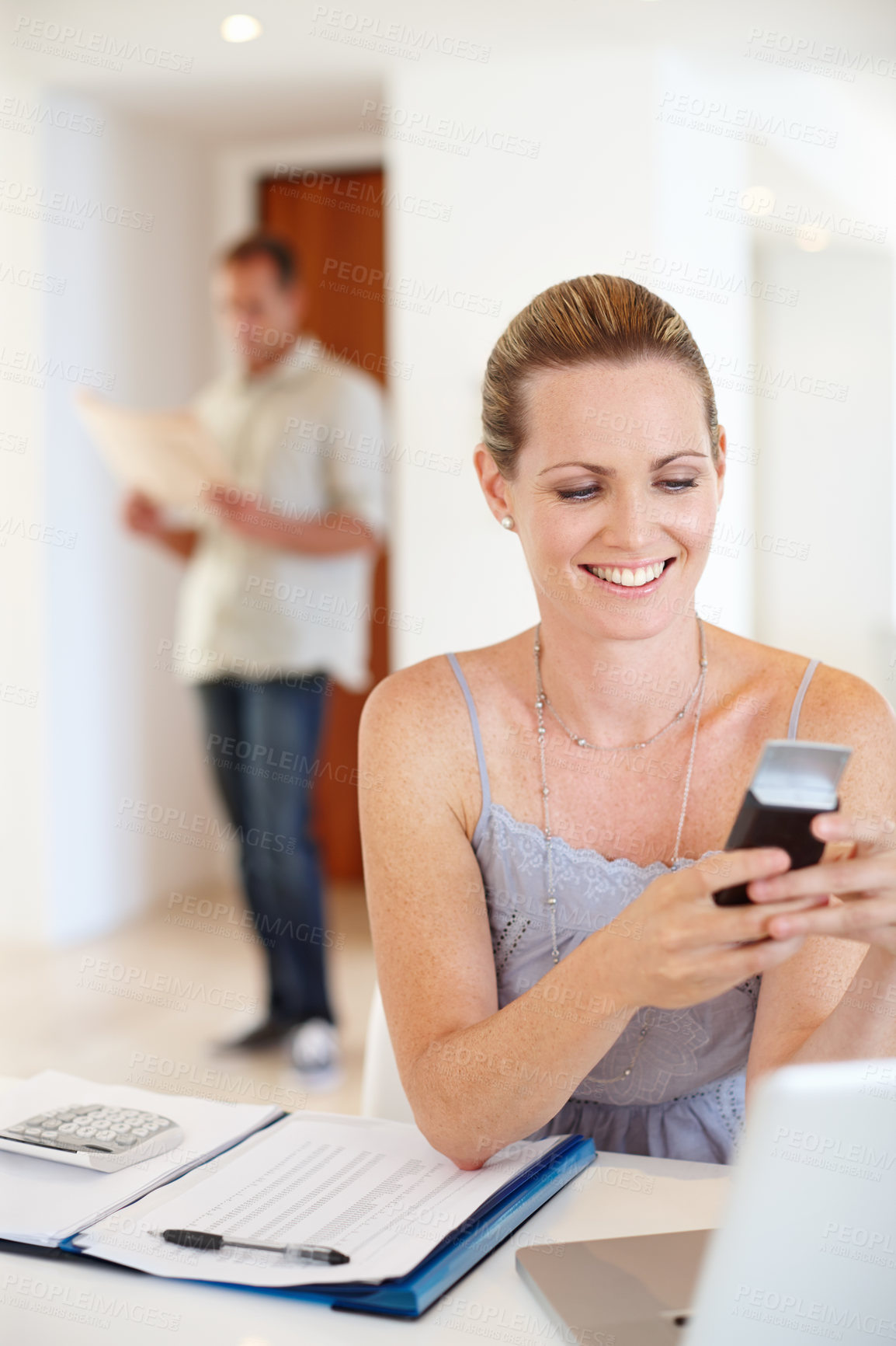 Buy stock photo Business woman, phone and happy with finance, planning and communication in accounting or remote startup.
Accountant or worker typing on mobile for chat, contact and email by document and calculator