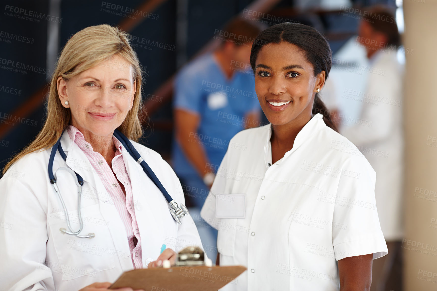 Buy stock photo Doctor, women and teamwork portrait in healthcare with clipboard, health information and smile in hospital. Medical partnership, professional and cardiology career for support, trust and diversity