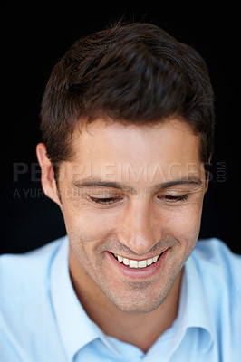 Buy stock photo Dark background, face and man with smile in studio, happiness and employee with business. Relax, male person and guy with joy for job or work in company, creative and startup and closeup of intern