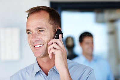 Buy stock photo Phone call, smile and businessman talking, speaking and chat on mobile conversation, discussion or networking in workplace. Consultant, communication and connect with smartphone for business deal