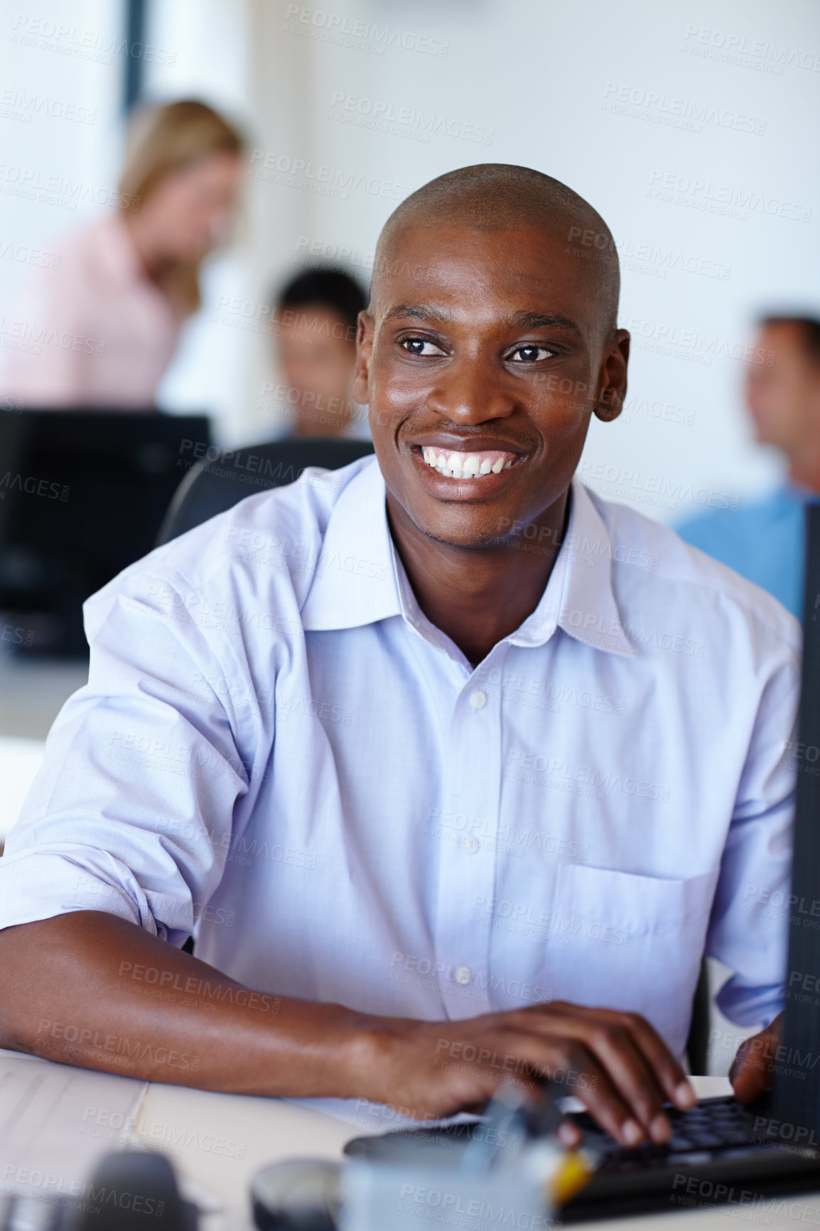 Buy stock photo African businessman, computer and smile in modern office with pride for online career, typing and emails. Black male person, technology and cheerful in workplace for web design start up company
