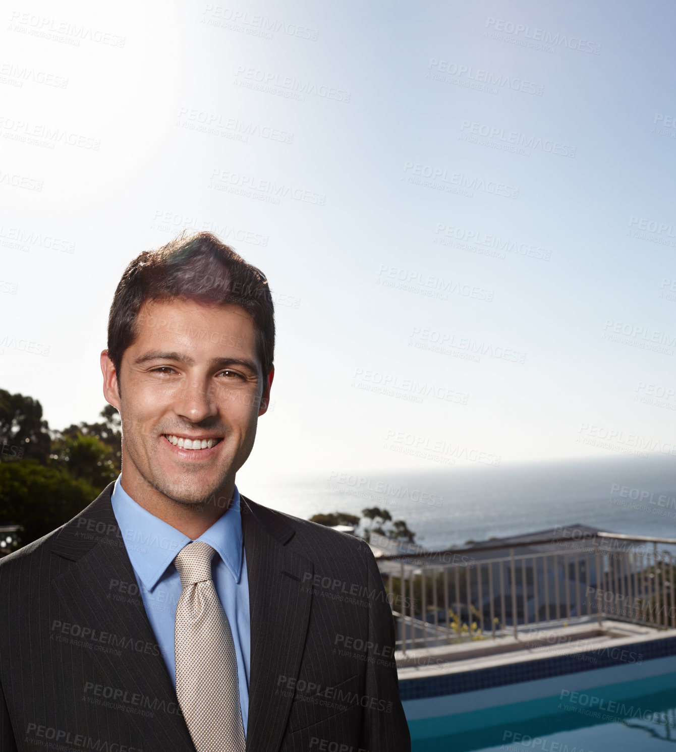 Buy stock photo Business man, suit and portrait with sky, space and outdoor on balcony with pride, smile and mockup by sea. Person, corporate employee and happy in summer, sunshine and ocean on rooftop in New York