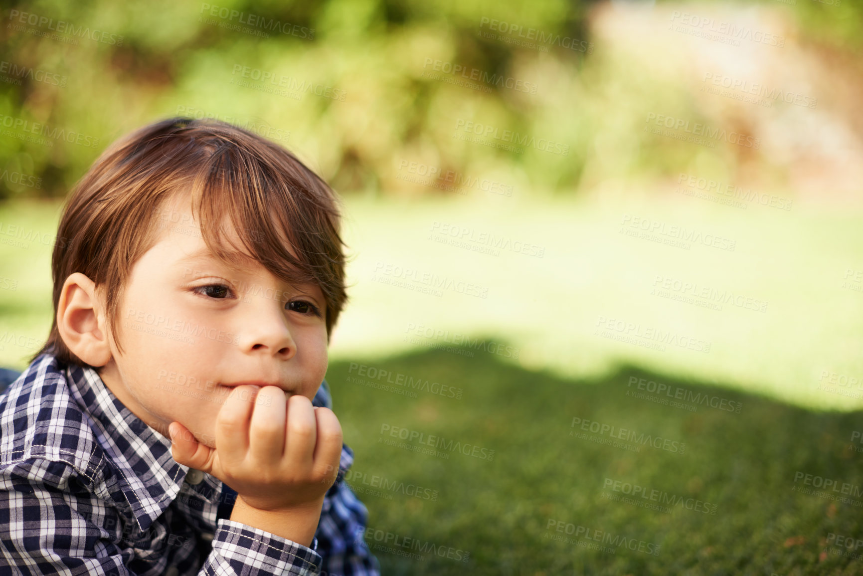 Buy stock photo Child, boy and thinking on grass outdoor on vacation with backyard in garden, park and field for memory. Kid, ideas and peace in spring, sunshine and remember in nature on holiday in Australia