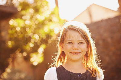 Buy stock photo Portrait, girl or happy kid outdoor at backyard in nature or cute student alone at park with bokeh. Face, smile or adorable young child in garden on summer vacation or holiday with sunshine in Sweden