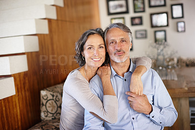 Buy stock photo Portrait, love and senior couple with a hug, retirement and relationship at home, romance and marriage. Face, support and old man with mature woman, embrace and happiness with romantic and wellness